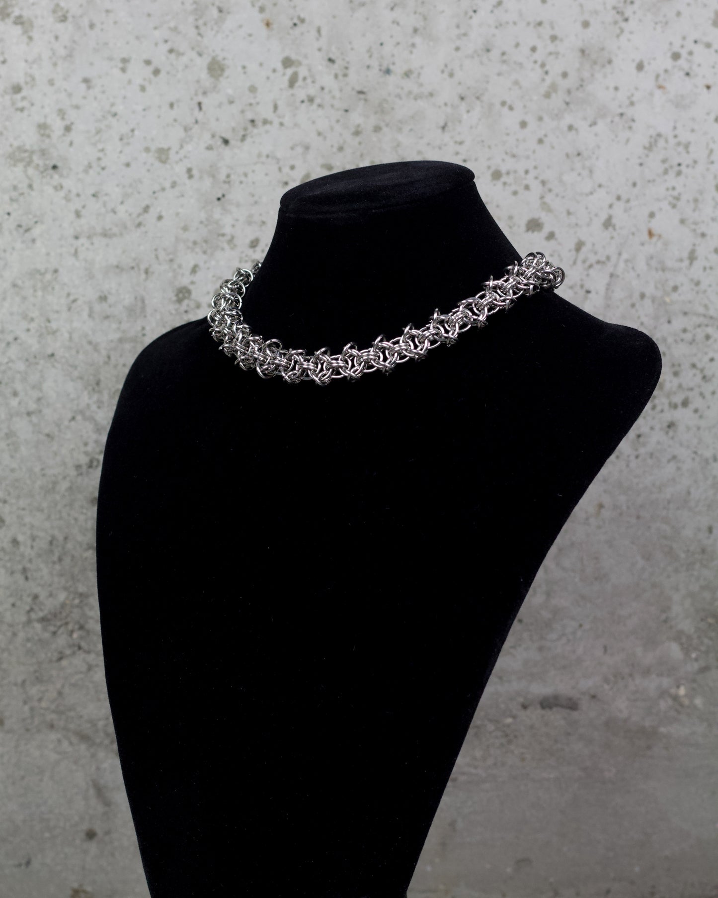 COLLIER « ÉTREINTE D’ACIER » 1/1