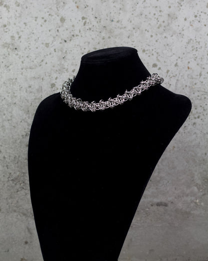 COLLIER « ÉTREINTE D’ACIER » 1/1