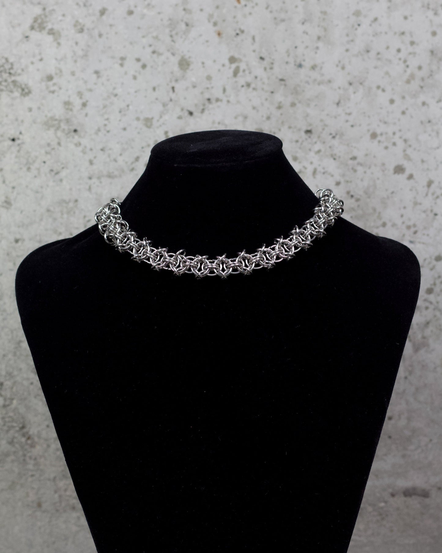 COLLIER « ÉTREINTE D’ACIER » 1/1